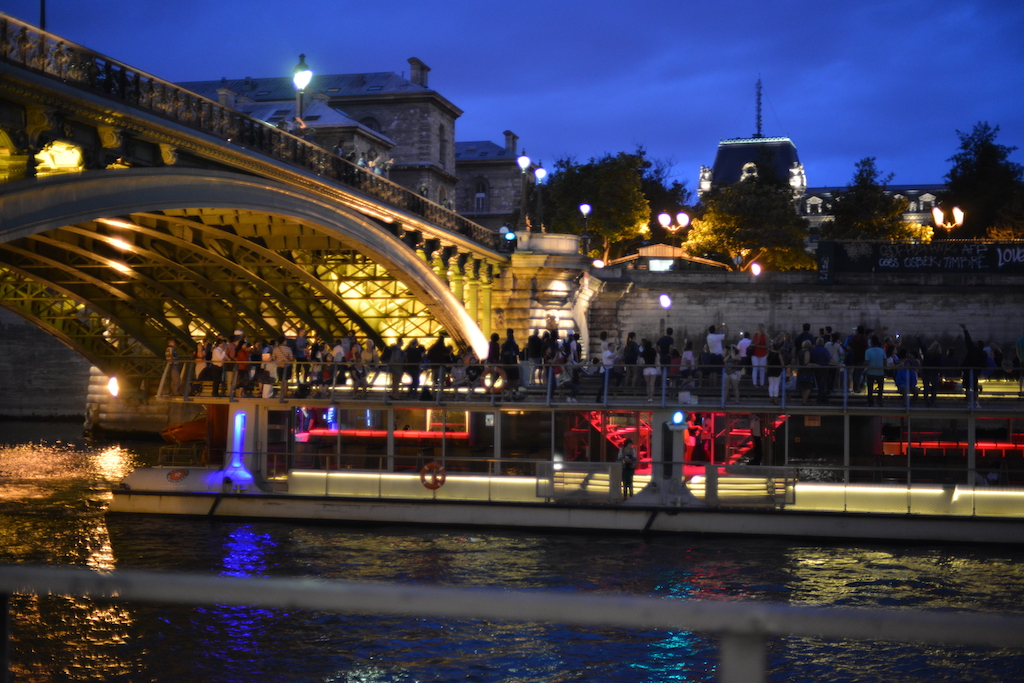 Paris Plages- A river cruise boat under the Pont Notre Dame